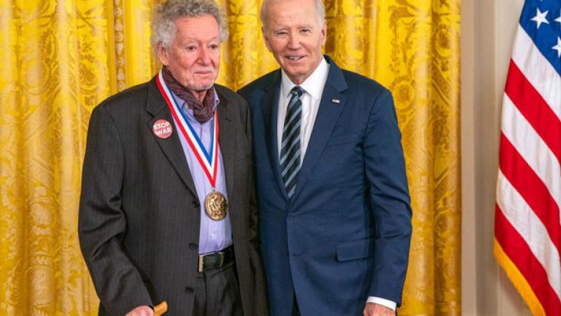 Sheldon Weinbaum posing with President Biden