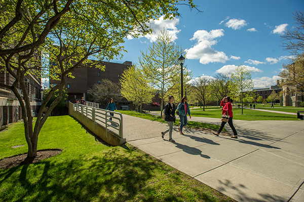 Students walk away from the JEC building during the Spring