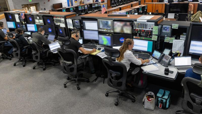 Members of the Artemis II launch team participate in an emergency escape or egress demonstration simulation for the Artemis II mission inside Firing Room 1 in the Launch Control Center at NASA’s Kennedy on Monday, Aug. 12, 2024. (NASA/Kim Shiflett)