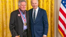 Sheldon Weinbaum posing with President Biden
